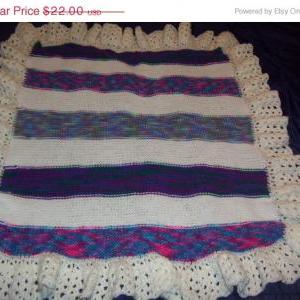 Hand Knit Varigated And White Stripe Baby Afghan..